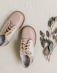 leather shoes featured in sand/fog