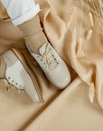 artie leather saddle shoe in color sand fog