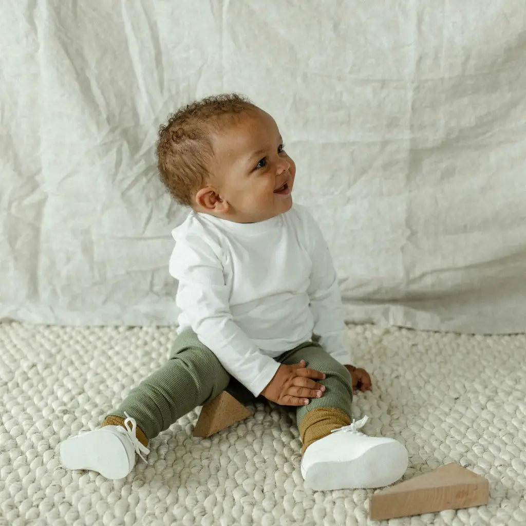 white leather oxfords, white laces, white sole. sizes 1-6