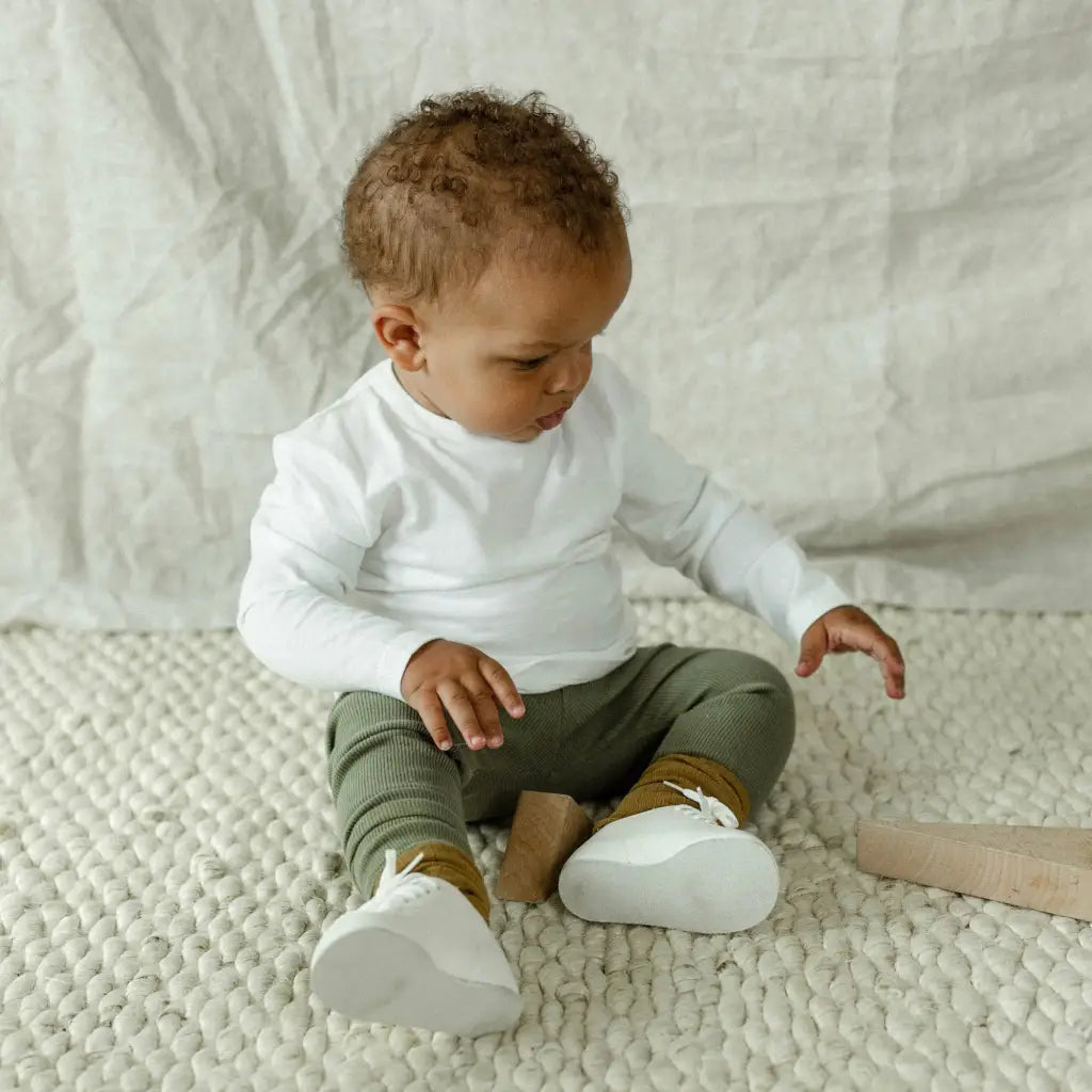 white leather oxfords, white laces, white sole. sizes 1-6