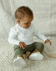 white leather oxfords, white laces, white sole. sizes 1-6