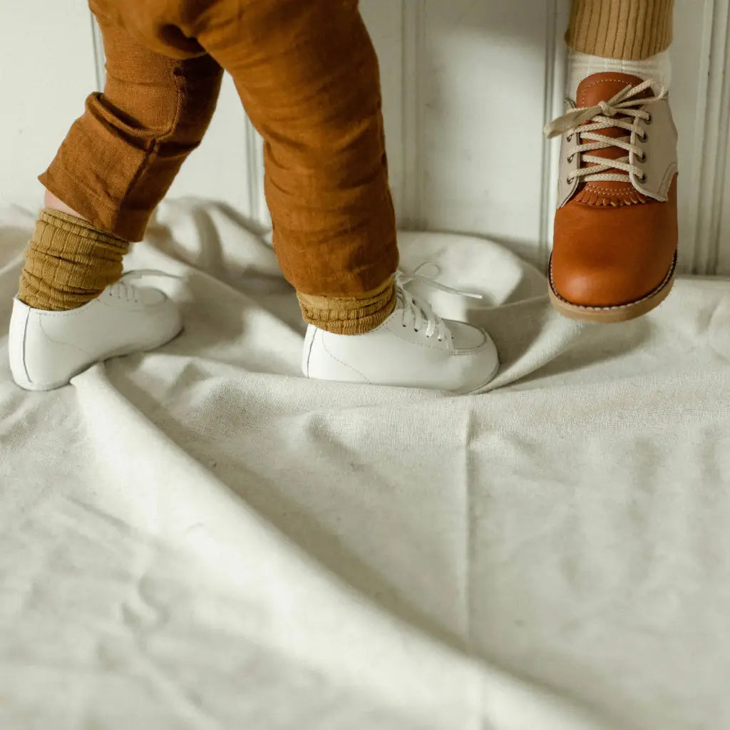 white leather oxfords, white laces, white sole. sizes 1-6