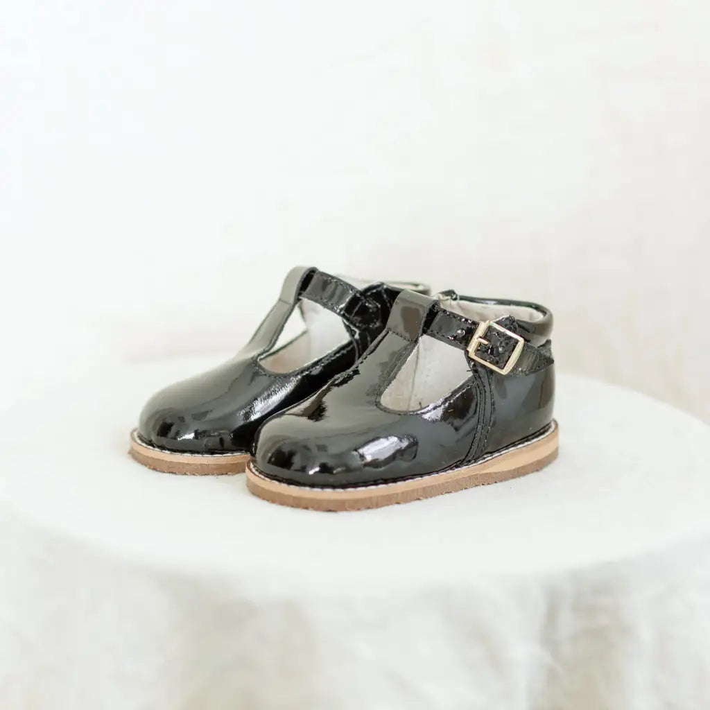 Greta T - Strap - Black Patent t - straps
