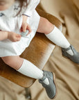 greta leather t-strap in color heron
