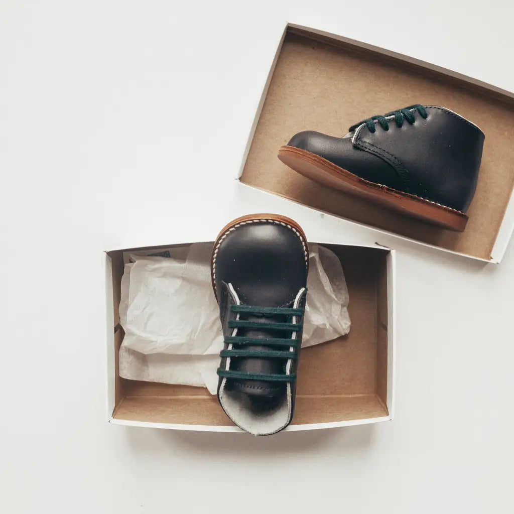 navy leather first walker, brown sole, navy laces, beige inside