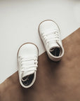 white leather first walker, brown sole, white laces, beige inside