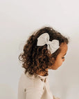 leather bow in color fog