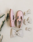 leather shoes in color peony featured with leather bows featured in color fog