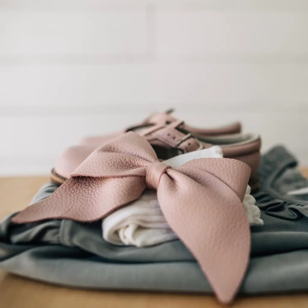 leather bow in color peony
