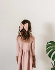 leather bow featured in color peony