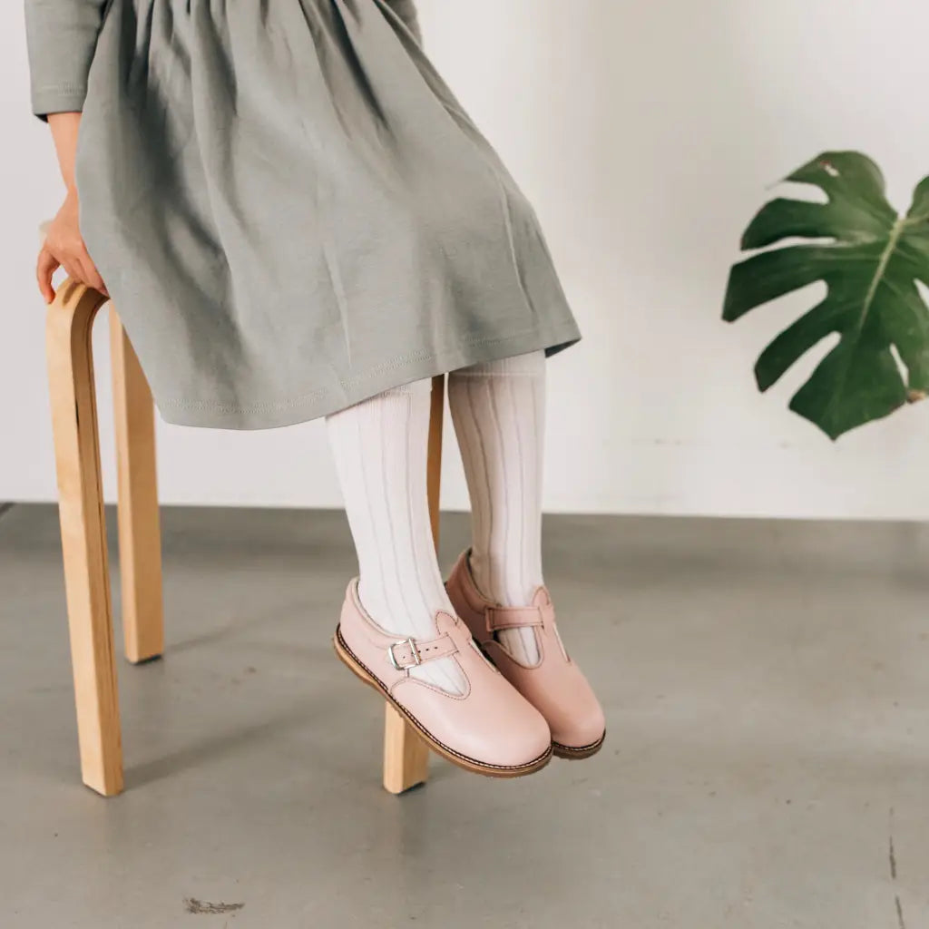 leather shoes featured in color peony