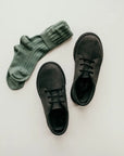 black nubuck leather oxfords, black sole, black laces