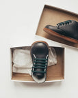 navy leather first walker, brown sole, navy laces, beige inside