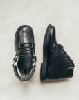 black leather boots, black lace, black soles