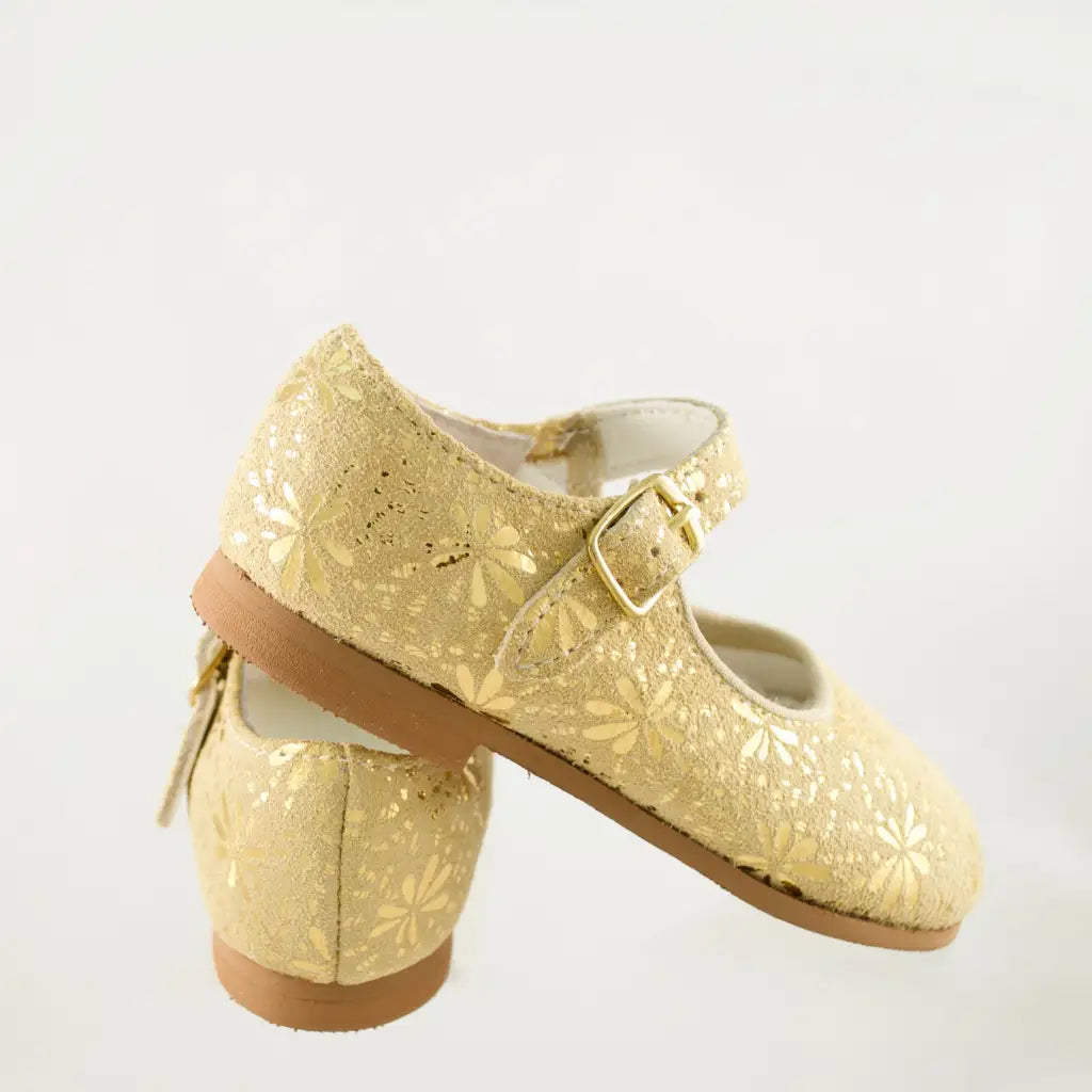 gold glitter leather mary jane, snowflake pattern, single strap, beige sole