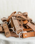 upcycled leather keychains in various shades of brown